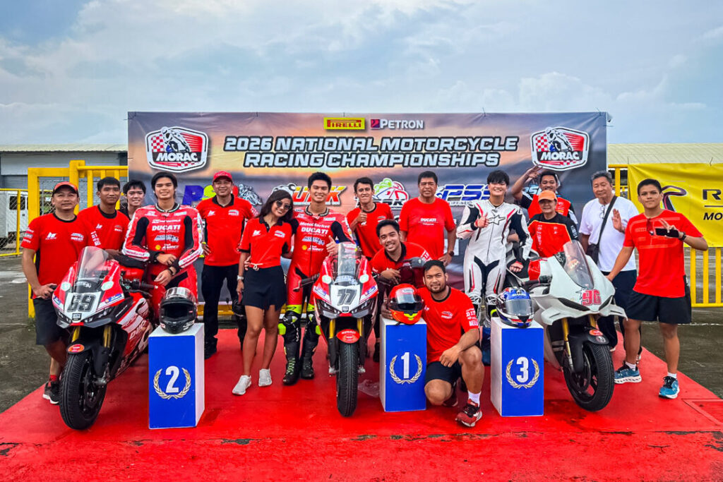 Access Plus Racing team group photo celebrating on the podium with three Ducati motorcycles after sweeping victories at the 2026 Philippine Superbike Championship