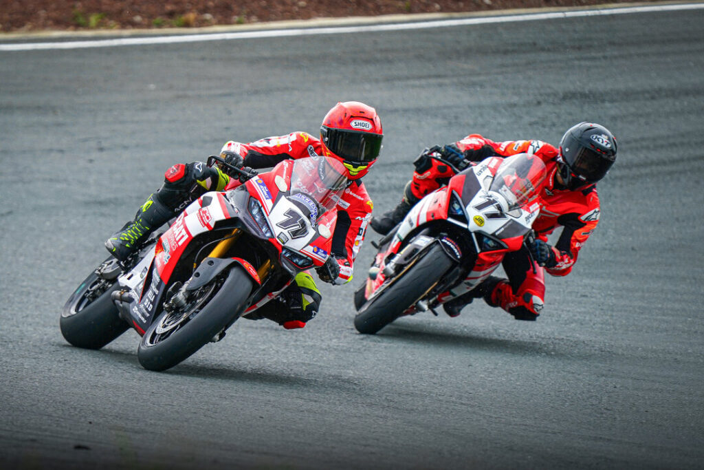 Troy Alberto leading TJ Alberto through a wet turn on twin Ducati Panigale V2s during the 2026 Philippine Superbike Championship.