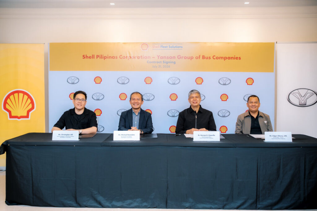 Executives from Shell Pilipinas and Yanson Group sit at a table following the signing of their 2026 fuel supply agreement in Manila.