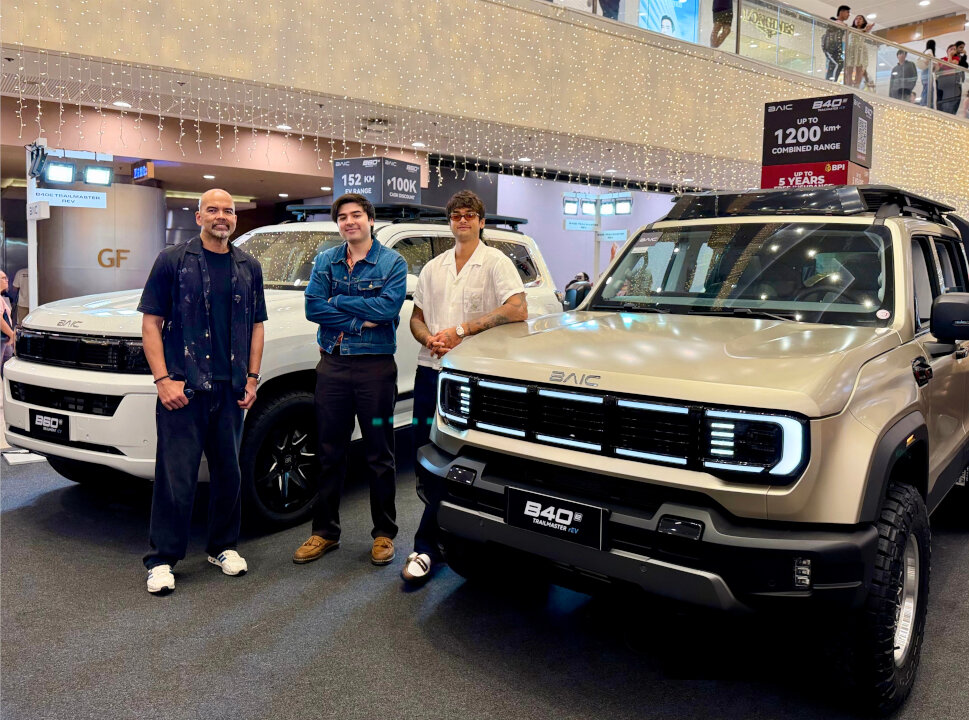 Andre, Benjie, and Kobe Paras endorsing the BAIC Philippines warranty and lineup at an indoor exhibition booth.