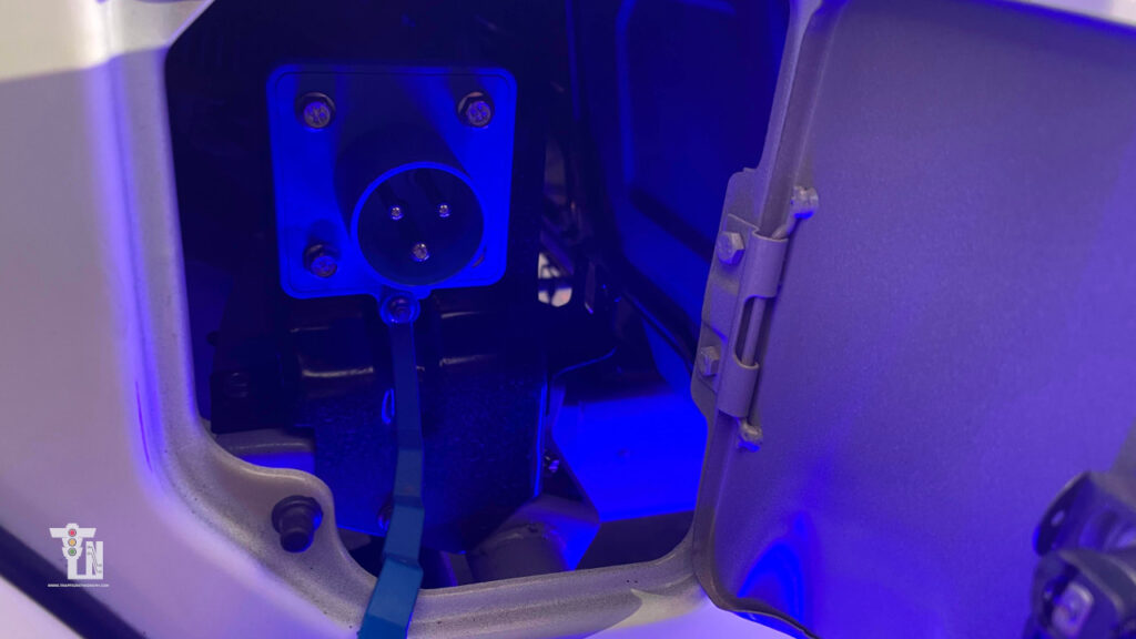 Onboard charger port on the Bajaj WeGo P5009 electric EV three-wheeler