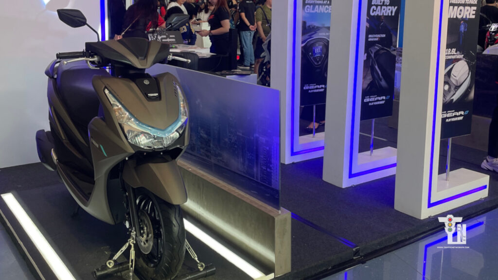 A newly unveiled commuter motorcycle on display at the Wheeltek Expo 2026 booth.