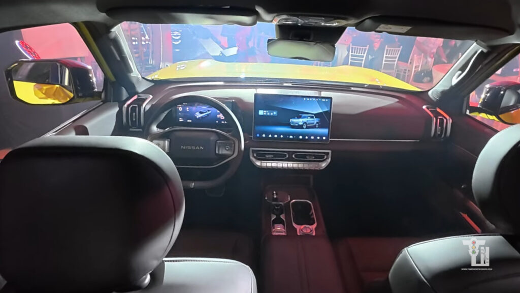 Interior cabin of the Nissan Navara Pro PHEV featuring 15.6-inch central display and ProPILOT controls