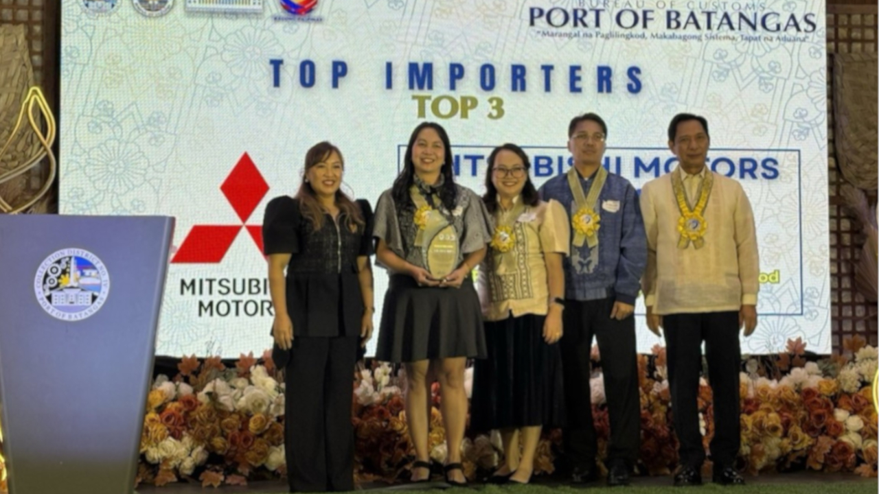 Mitsubishi Motors Philippines logistics representatives receiving the Top 3 Importers award from Bureau of Customs Port of Batangas officials
