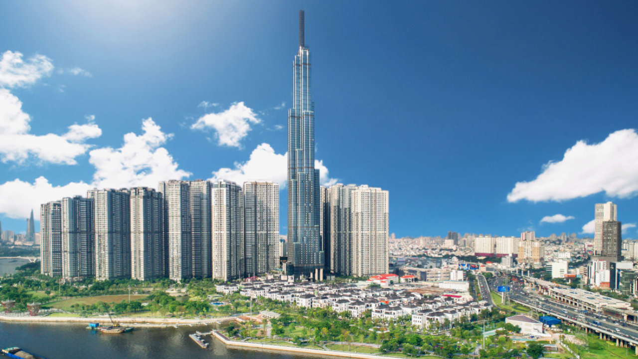Wide exterior shot of the Landmark 81 skyscraper developed by Vingroup TIME World's Best Companies 2026 honoree along the Saigon River in Vietnam.