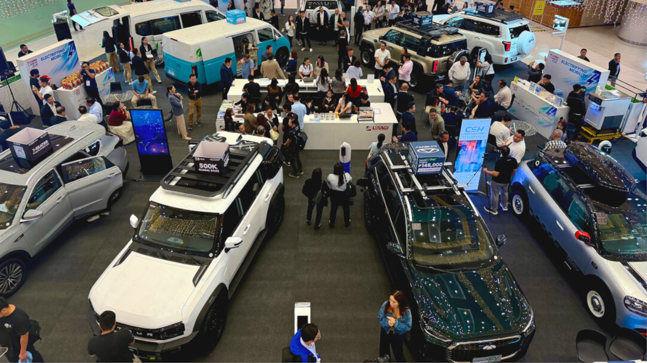 Overhead view of the busy UAAGI event, with various BAIC vehicles, showcasing the strong interest in the BAIC Philippines warranty and offerings.